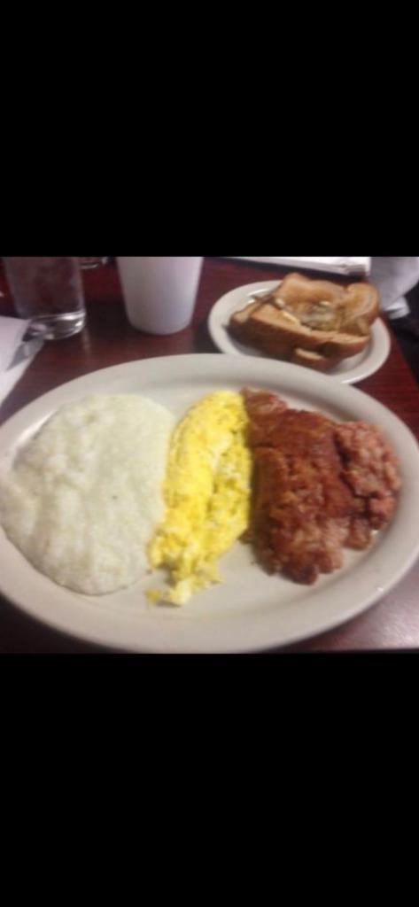 2 Eggs any Style with Corned Beef Hash · Served with Home fries and toast.