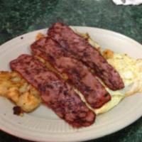 2 Eggs any Style with Turkey Bacon · Served with Home fries and toast.