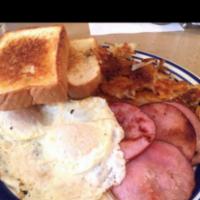 Two eggs any style with Canadian Bacon · Served with home fries and toast.