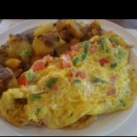 Western Omelet · Ham, onion and peppers. Served with choice of side and toast.