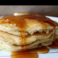 Buttermilk Pancakes · Served with butter and syrup.