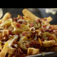 Loaded Fries · Crispy fries topped with chili, cheddar cheese  and jalapenos.