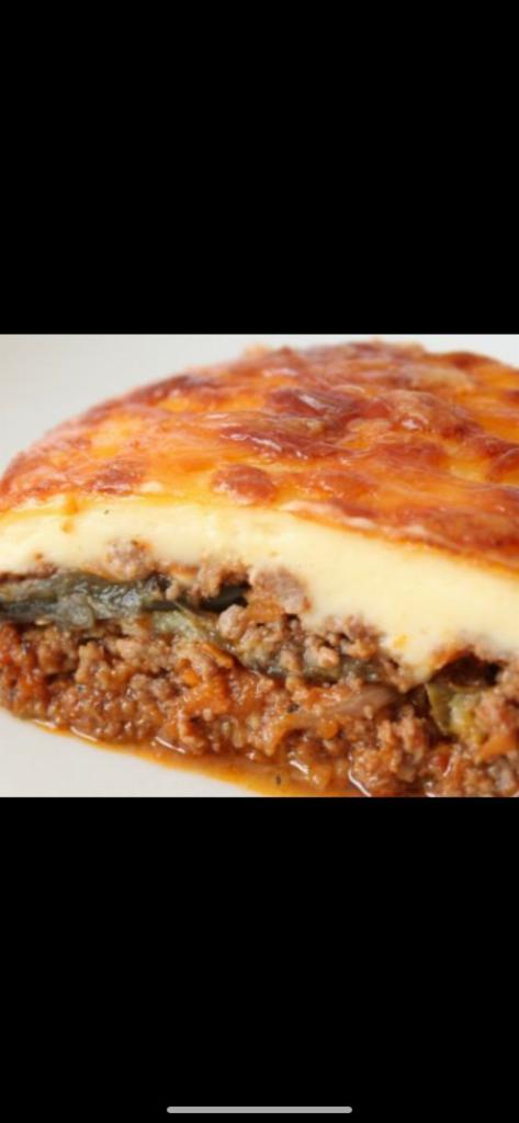 Moussaka · Layers of eggplant, potatoes and seasoned ground beef, topped with bechamel cream sauce and oven baked. Served with choice of side, bread and butter.