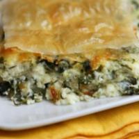 Spanakopita · Spinach pie with feta cheese and spinach leaf baked to a golden brown in phyllo dough. Serve...