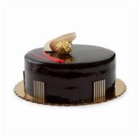 Chocolate Mousse Cake · Chocolate cake with chocolate mousse filling covered in chocolate ganache.