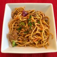 The Asobi · Our take on yakisoba noodles with steak, scallions, shredded cabbage and carrots in our hous...