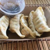 5 Piece Gyoza Side · Chicken potstickers served with house made dipping sauce.