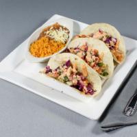 3 Piece Shrimp Tacos · Flour tortillas filled withrilled shrimp, topped with our special creamy chipotle sauce. Ser...