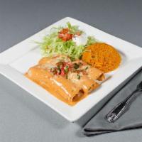Chipotle Enchiladas · 3 corn tortillas stuffed with shredded chicken topped with our cheesy chipotle sauce, pico d...