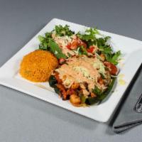 Stuffed Poblano · Poblano pepper stuffed with melted cheese topped with your choice of steak or chicken. Serve...