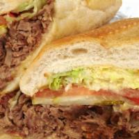 Chopped Cheese Hero · pure Angus ground beef served with sauteed onions, peppers and melted cheese on a bed of let...