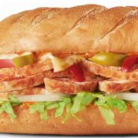 Cajun Chicken Hero · Mild Cajun Chicken, Cheddar cheese and roasted red peppers served with Lettuce and tomatoes.