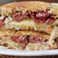 Ruben sandwich · hot boar's head pastrami or corned beef, melted Swiss cheese and sauerkraut and Russian dres...