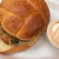Crab cutlet Sandwich · Breaded  Fried Crab cutlet served on a brioche bun with lettuce and tomatoes, mayonnaise and...