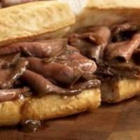 Rose Power Hero · Roast beef, mozzarella cheese, onion Ring and gravy on a toasted hero   
