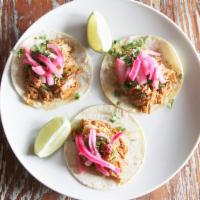 3 Piece Cochinita Pibil Tacos · Slow cooked pork in a dried chili sauce.