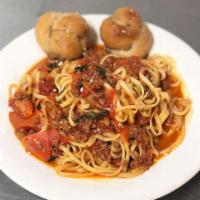 Pasta with Meat Sauce · Our homemade meat sauce.