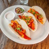 Fish Tacos · 3 soft fish tacos, served with pico de gallo and white sauce and rice.