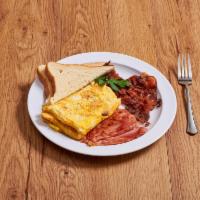 Hungry Man · Three eggs, bacon, ham, sausage and cheese. Served on a plate. Served with toast or bagel wi...