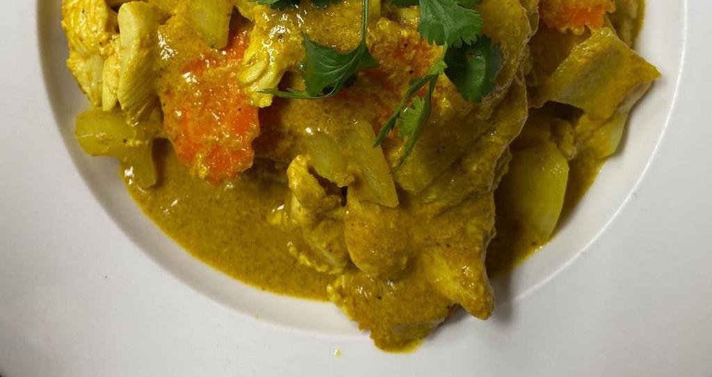 Yellow Curry and Rice · Carrot, onion, potato, coconut curry sauce, cilantro.