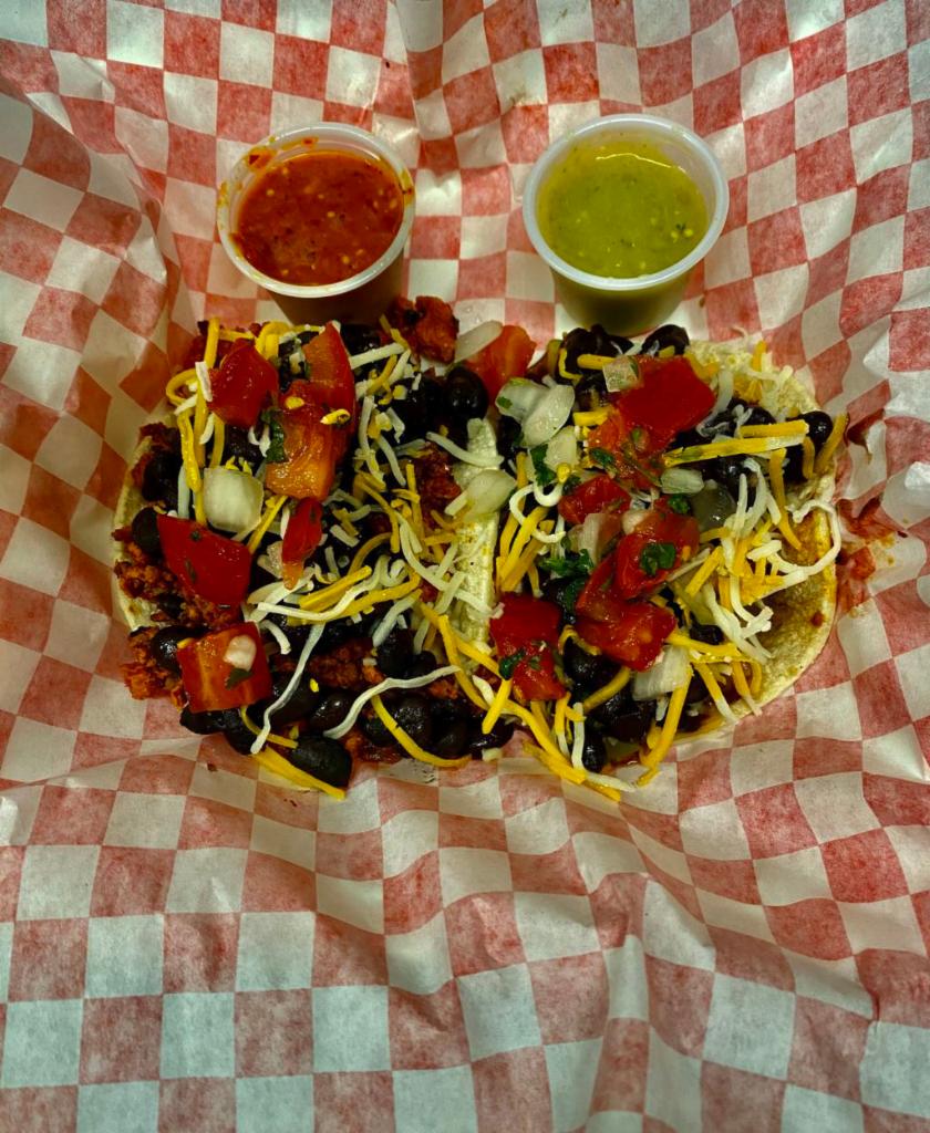 Vegetarian Tacos · Choice of filling. Topped with black beans, pico de gallo, and cheese.

