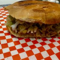 Tortas · Grilled Mexican bread with choice of meat or vegetarian topped with Refried beans, lettuce, ...