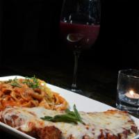 CHICKEN PARMIGIANA · Pan Fried Breaded Chicken Breast with Mozzarella and Tomato Sauce and a Side of pasta.(Pink ...