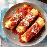 BAKED MANICOTTI · Cheese filled pasta tubes with marinara. Baked with Parmesan and mozzarella cheese.