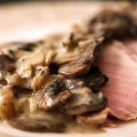 ROASTBEEF W/ MUSHROOM GRAVY · Tender thin slices of roastbeef with homemade mushroom gravy
