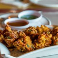 Pakoras Compassion · Chickpea battered fritters.

