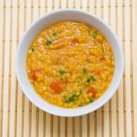 Daal Saag Saagwala · Yellow lentils cooked with fresh spinach and spices.
