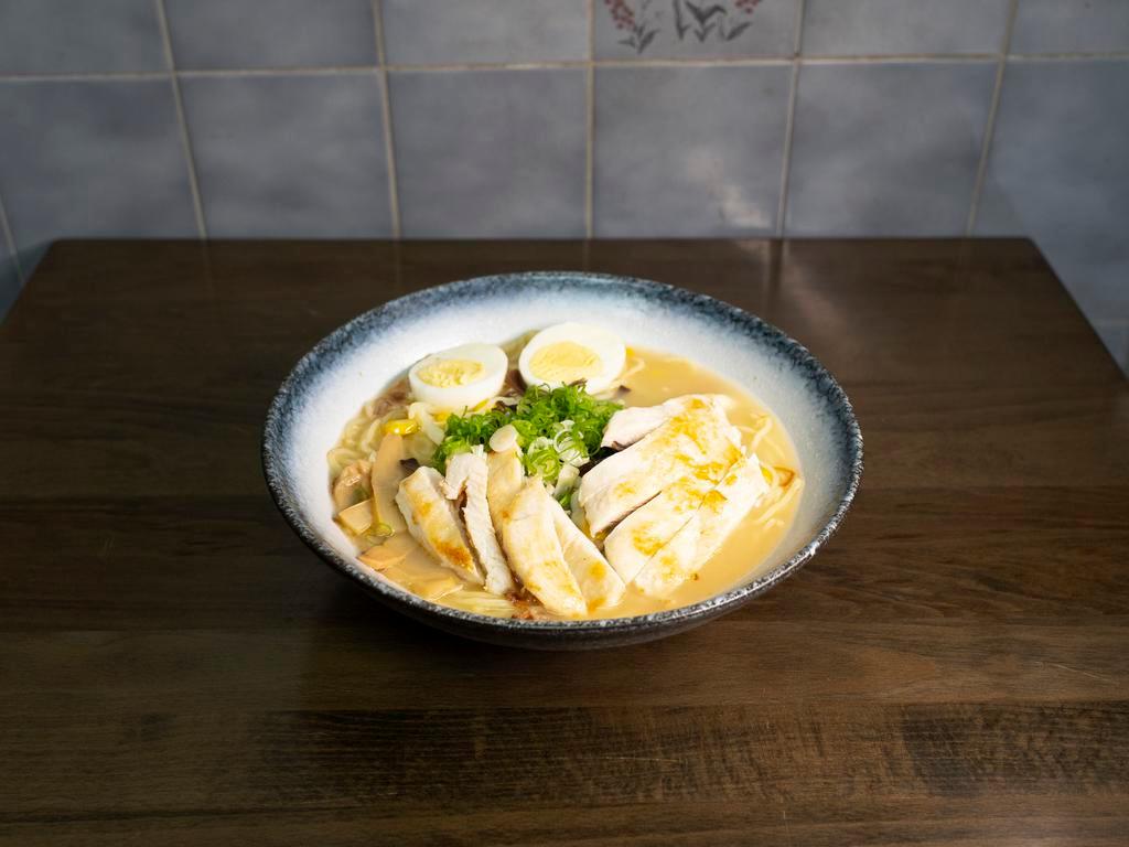 Chicken Ramen · Wavy noodle in our homemade soup topped with scallion, bean sprouts, cabbage, corn, and half-boiled egg.