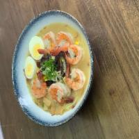 Shrimp Ramen · Wavy noodle in our homemade soup topped with scallion, bean sprouts, cabbage, corn, and boil...