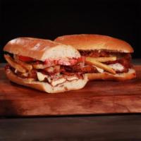 Fat Sandwich · Chicken cutlet, American cheese, bacon, and oven-roasted tomatoes topped with house-made fri...
