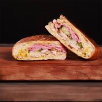 Cuban Sandwich · Roasted pork, ham, Swiss cheese house-made pickles, and mustard.