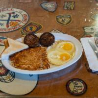 2 Eggs · Eggs your way served with toast or biscuit and a choice of grits or hash browns.
