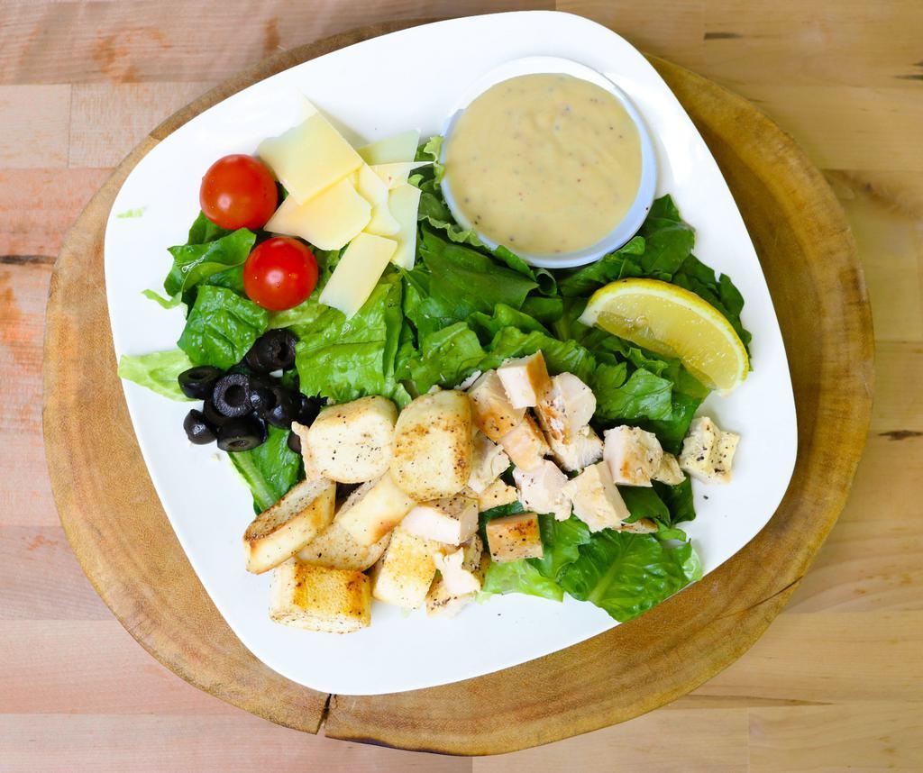 Chicken Caesar Box Lunch · Romaine Lettuce, cherry tomatoes, parmesan, lemon wedge, croutons, grilled lemon pepper chicken, with our home-made black peppercorn Caesar dressing.