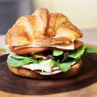 Turkey Sandwich Box Lunch · Roasted turkey, bacon, Havarti cheese, mixed greens, tomato, avocado, on a croissant. With a...