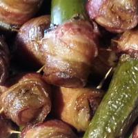Jalepeno Poppers · Bacon wrapped- mushroom-topped sausage stuffed jalepeno popper. These are larger-than-averag...