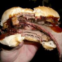 Hillbilly Burger · Sliced Beef sandwich with chips.