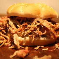Pulled Pork Sandwich · With chips.