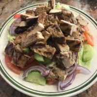Mariella Grilled Chicken Salad · Lettuce, tomato, onion, cucumber and olives, topped with diced grilled chicken and house dre...