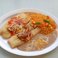 Tamale Plate · 2 tamales. Comes with rice and beans.