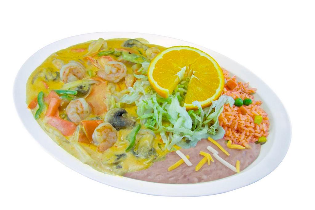 Camarones a la Crema Plate · Comes with choice of dressing, rice and beans.