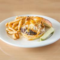 Westgate Burger · 8 oz burger, BBQ sauce, onions rings and cheddar on a brioche bun. served with fries and a p...