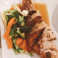 14. 3 Taste Fish · Crispy fried fish served with steamed mixed vegetables and topped with special sweet sweet s...