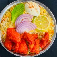 238. Boneless Chicken Dum Biryani ·  the rice and meat is cooked in an earthen pot and the lid is sealed with dough and it is co...