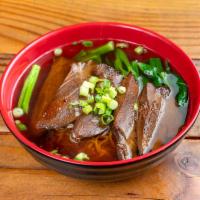 N2. Braised Beef Noodle Soup · Noodle soup with beef, vegetable, and, scallions




