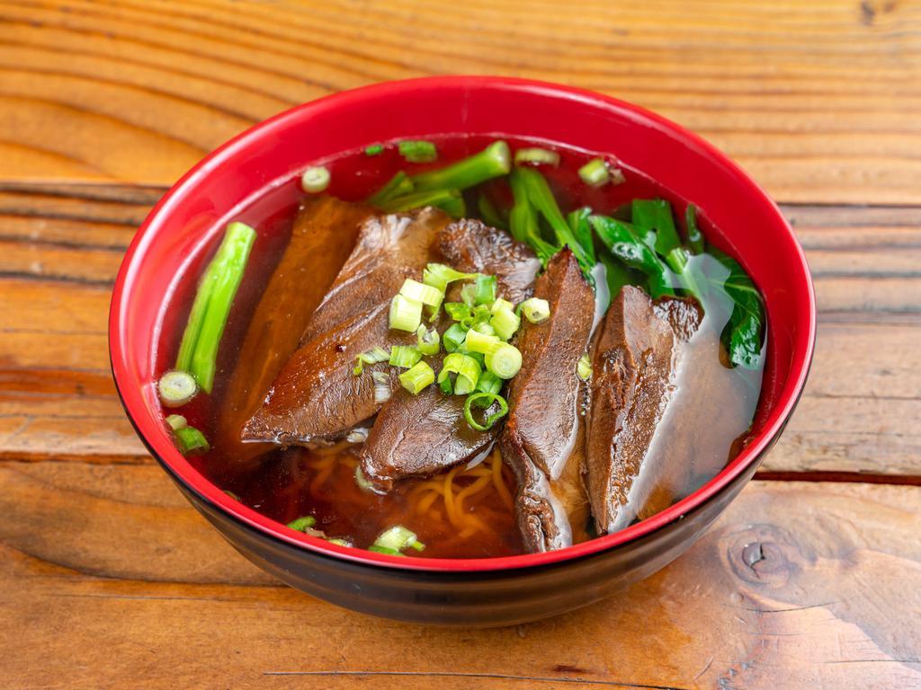 N2. Braised Beef Noodle Soup · Noodle soup with beef, vegetable, and, scallions




