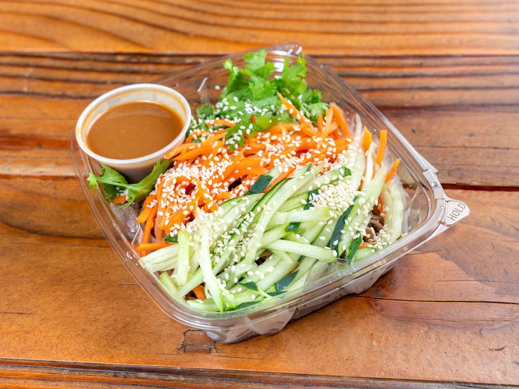 N10. Sesame Noodles with Peanut Sauce · Cold buckwheat noodles with carrot, cucumber, cilantro, and sesame seeds